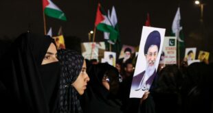 shiite muslim supporter of the imamia student organization iso holds a portrait of iran s supreme le 1772315251 ea56604263a962f56604263a903666v